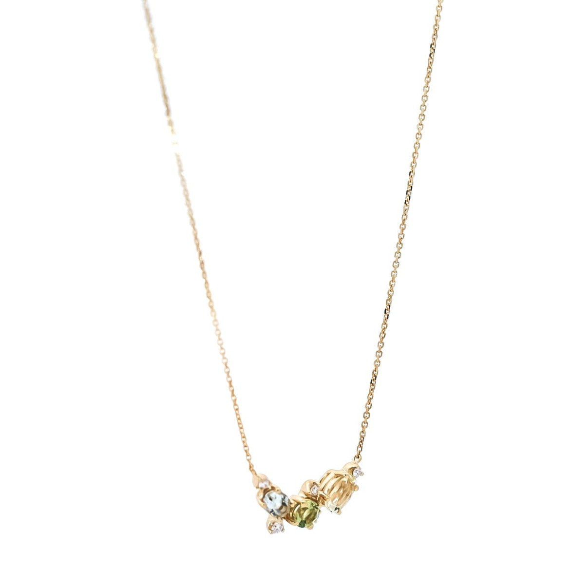 Collar en oro amarillo 18kt con diamantes peridoto y cuarzo
