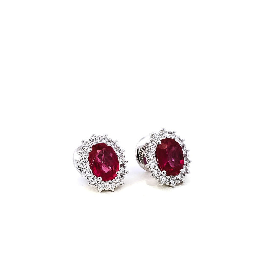 Aretes oro blanco tipo topo con halo en diamantes y rubís