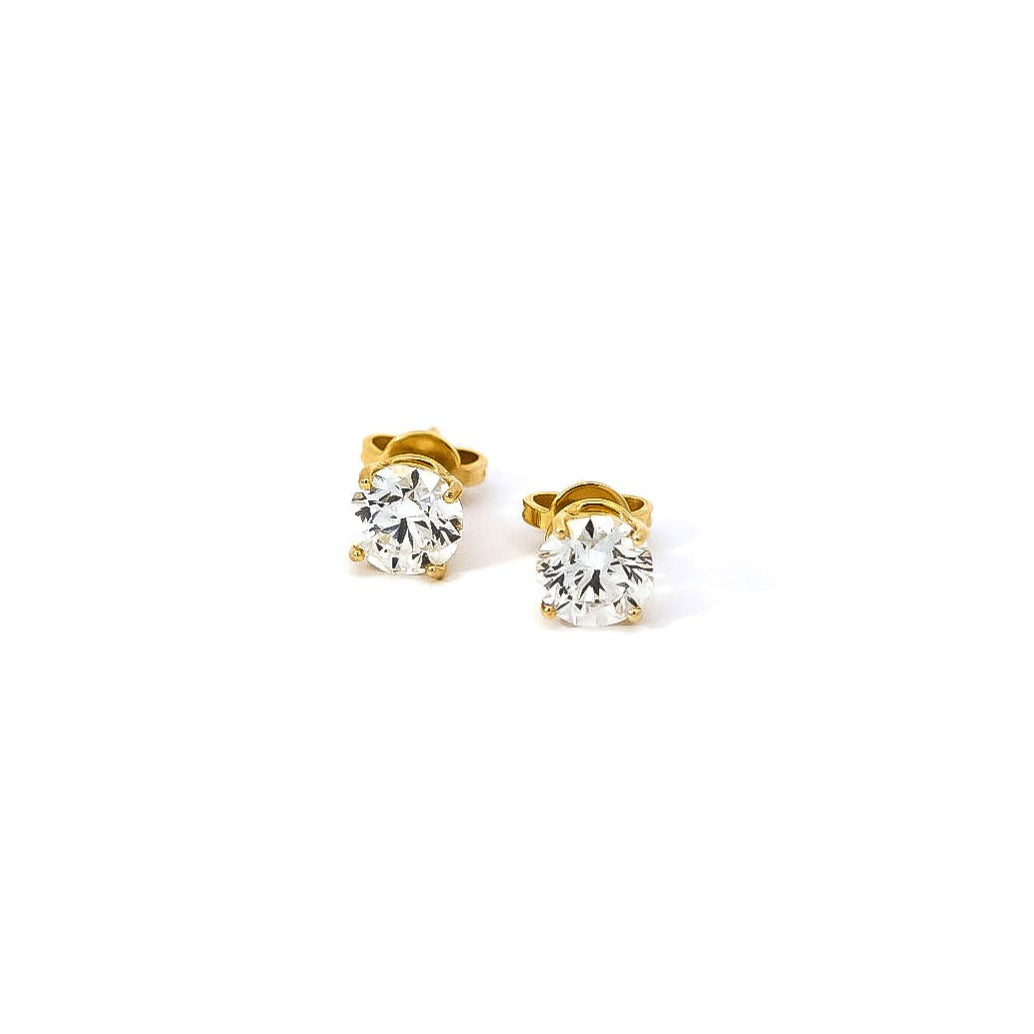 Aretes solitarios  con diamantes en oro amarillo 18kt
