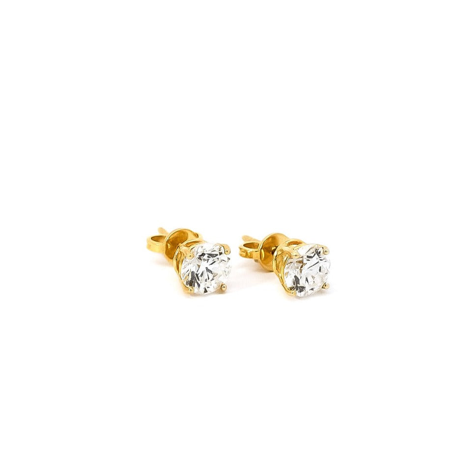 Aretes solitarios  con diamantes en oro amarillo 18kt