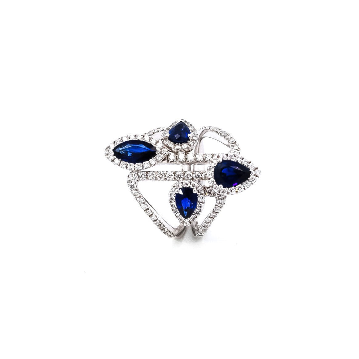 Anillo oro blanco diseño de líneas entrelazadas con zafiros corte pera