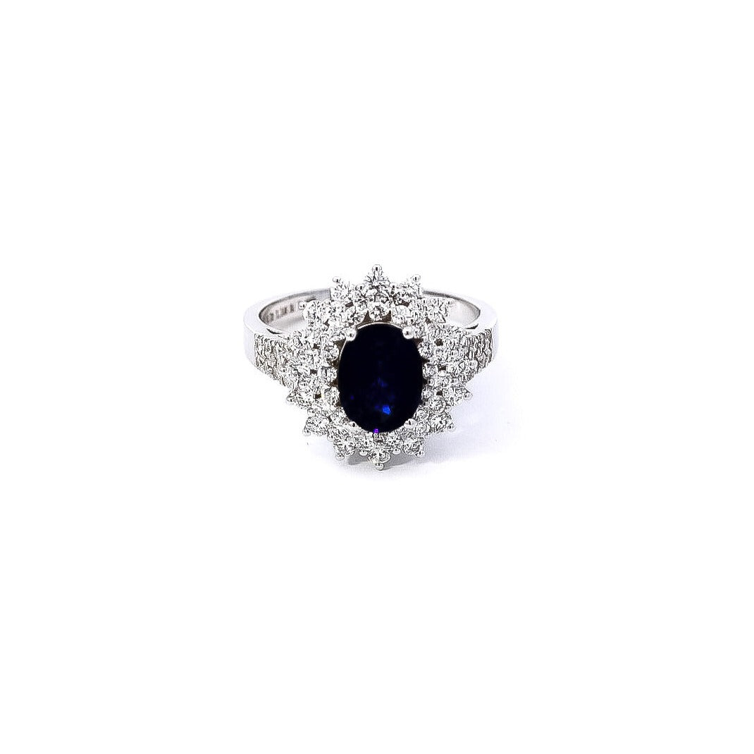 Anillo oro blanco con doble halo de diamantes y zafiro 1.90ct corte ovalado