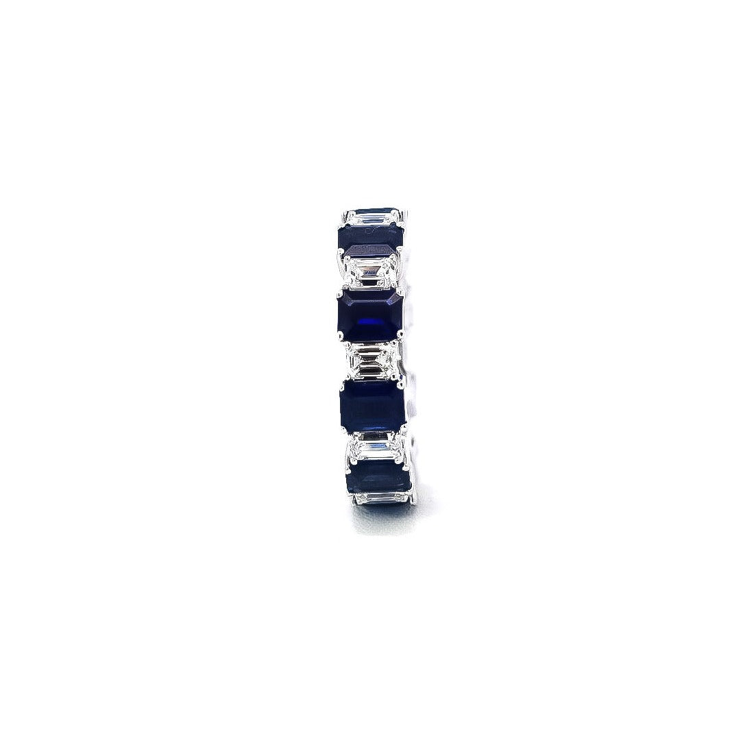 Anillo oro blanco tipo banda con diamantes y zafiros cortes radiante