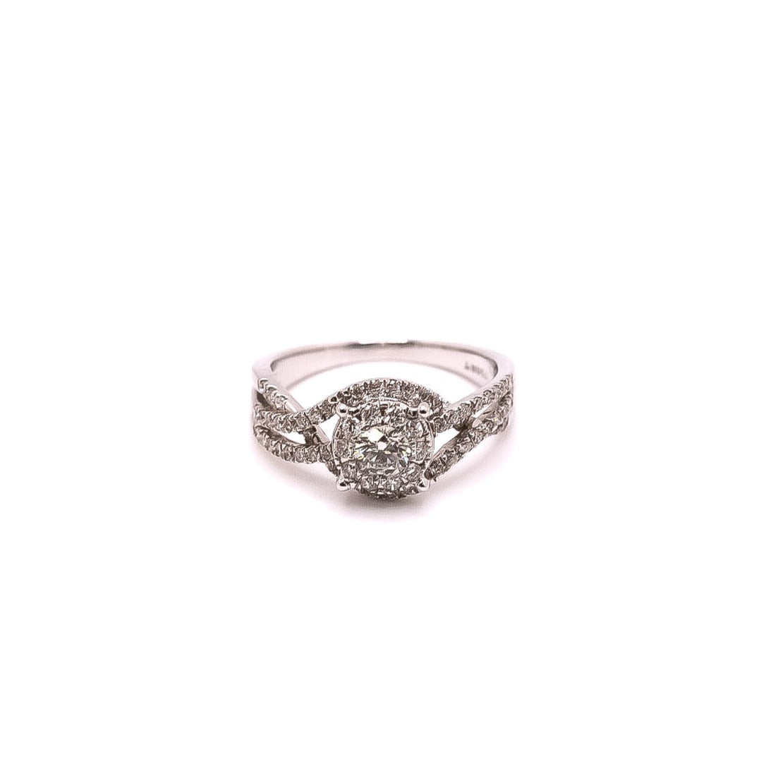 Anillo oro blanco tres líneas de diamantes entrelazadas con diamante central