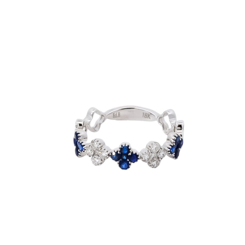 Anillo oro blanco con diseño de flores en diamantes y zafiros