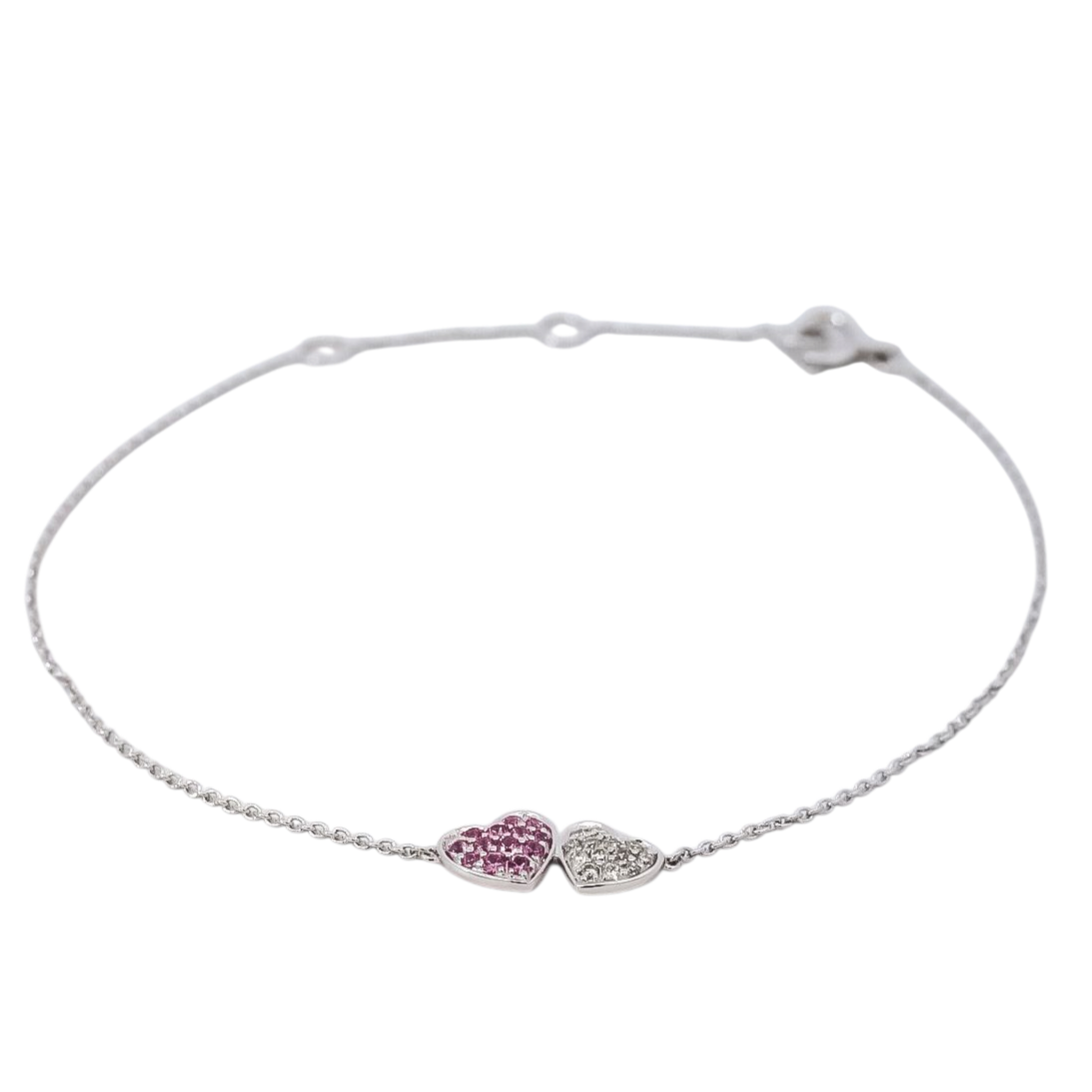 Pulsera oro blanco dije de doble corazón en diamantes y zafiro rosado