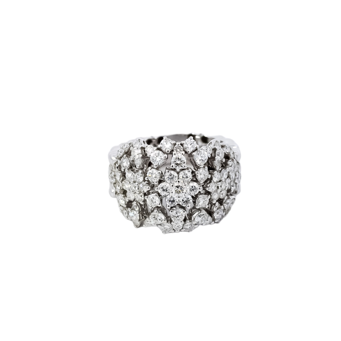 Anillo oro blanco elástico con diamantes diseño de flores