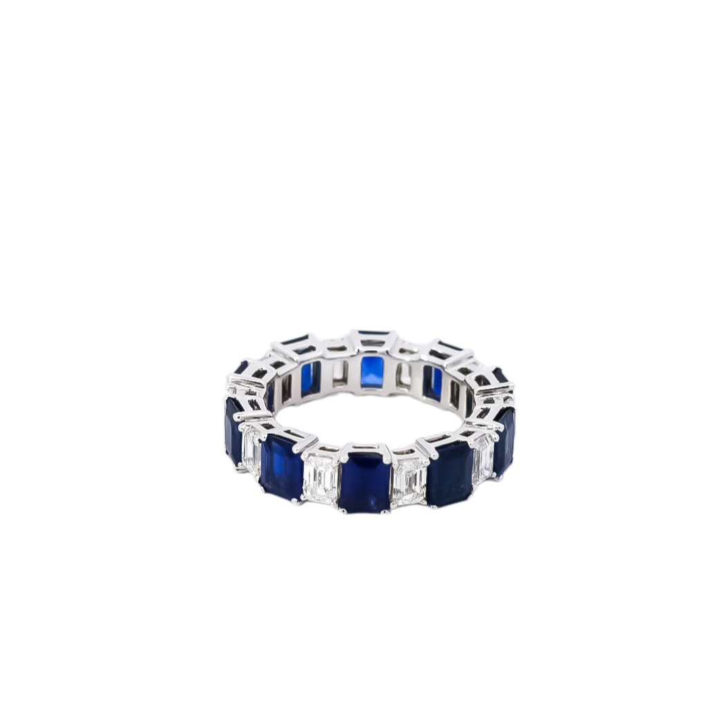 Anillo oro blanco tipo banda con diamantes y zafiros cortes radiante