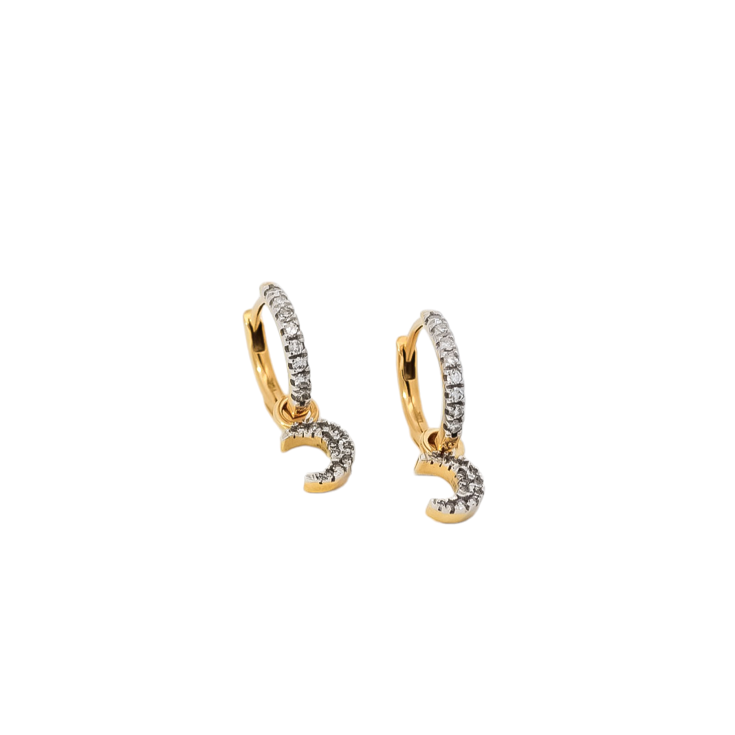 Aretes tipo argollas en oro amarillo 18kt con dijes de lunas diamantadas