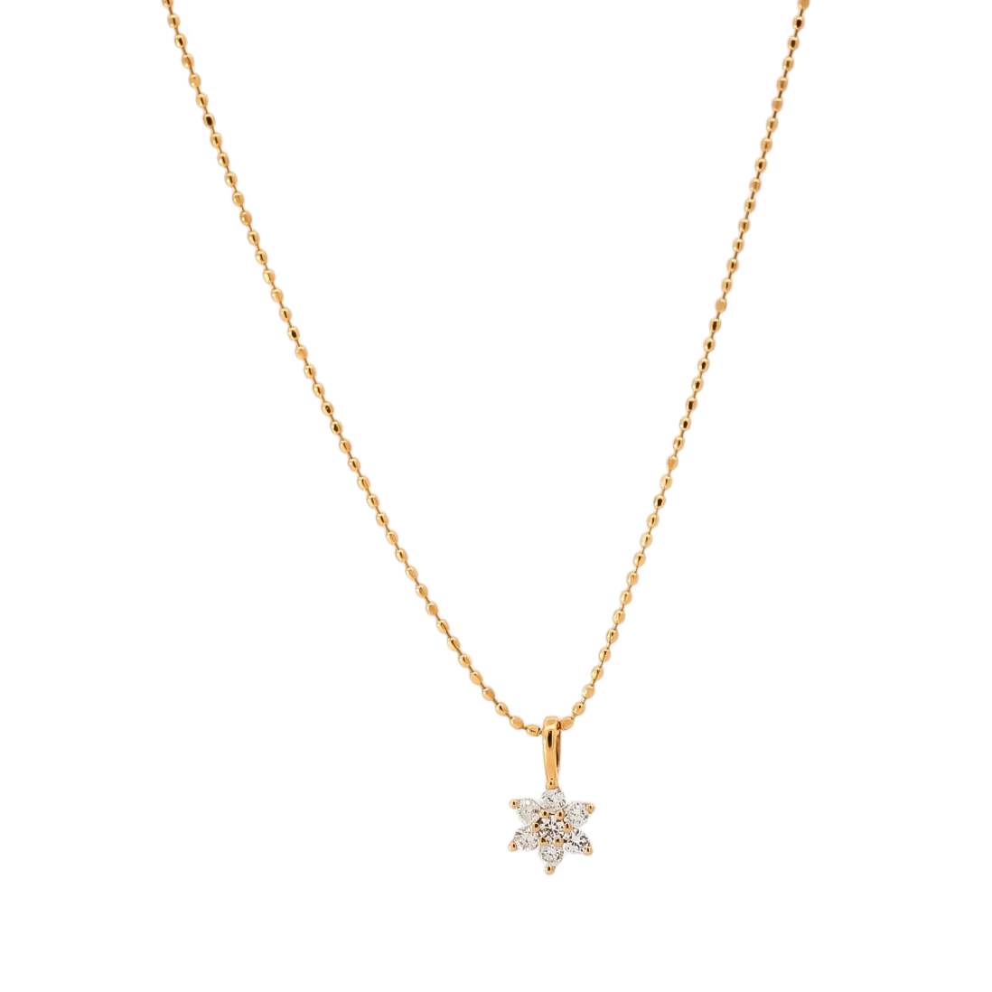 Dije en oro amarillo  con diseño de flor en diamantes