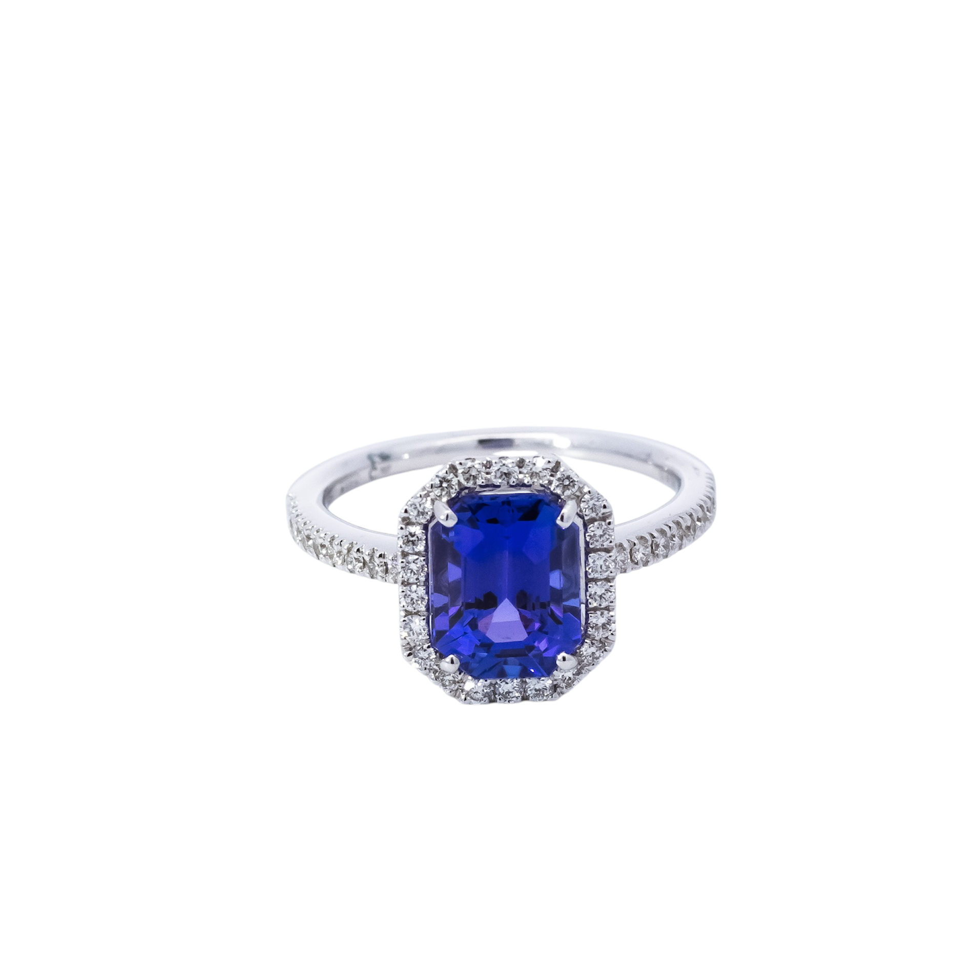 Anillo oro blanco 18kt tipo Riviera con halo de diamantes  y Tanzanita