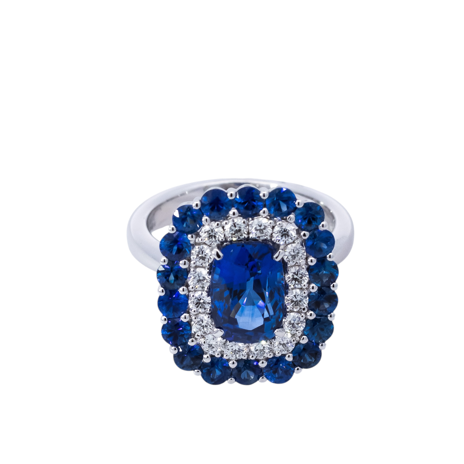 Anillo oro blanco 18kt con diseño de doble halo en diamantes y zafiros ,piedra central zafiro 3.17ct