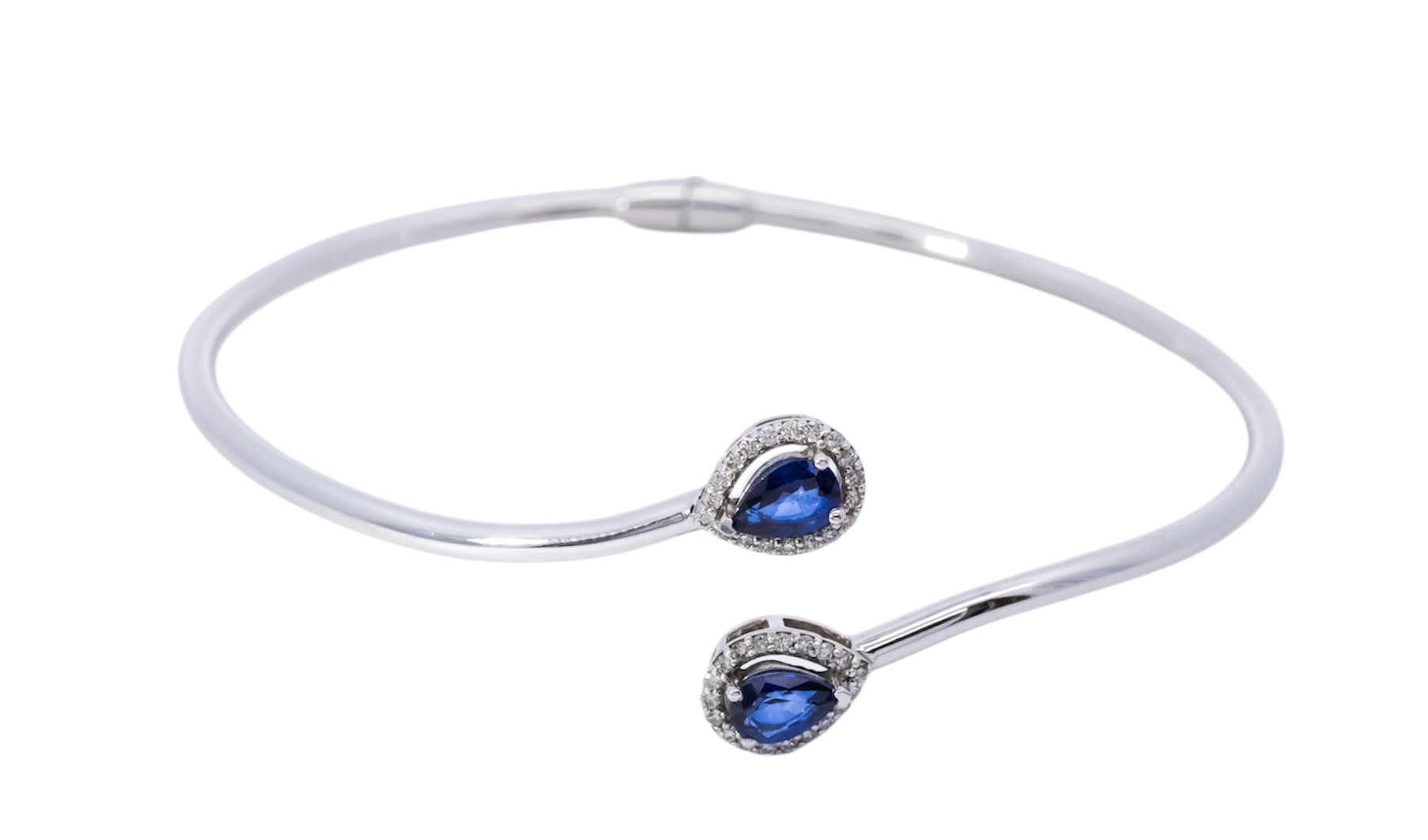 Pulsera oro blanco 18kt tipo caña con diamantes y zafiros corte pera