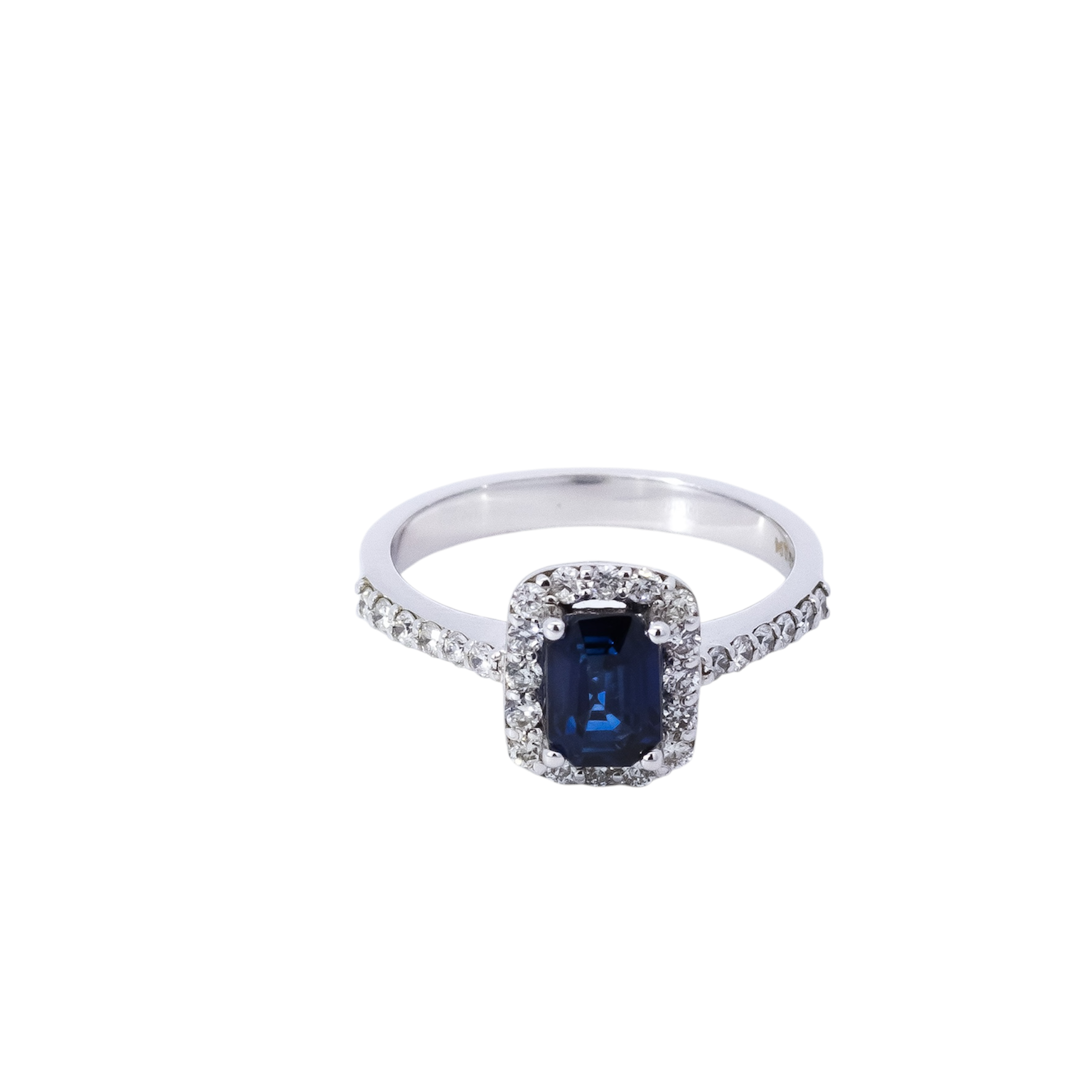 Anillo oro blanco 18kt tipo Riviera con halo de diamantes y zafiro corte esmeralda