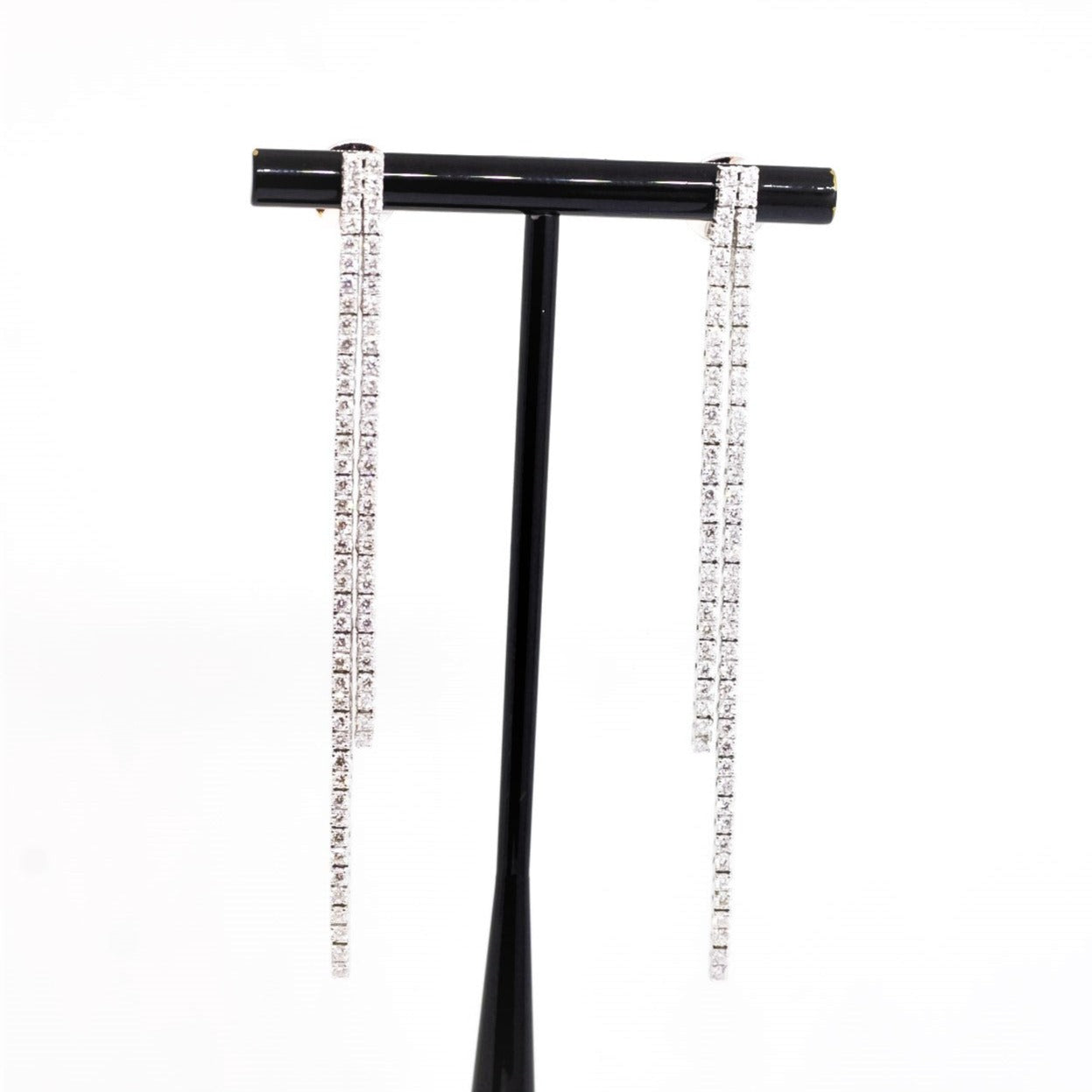 Aretes tenis doble filas  en oro blanco 18kt