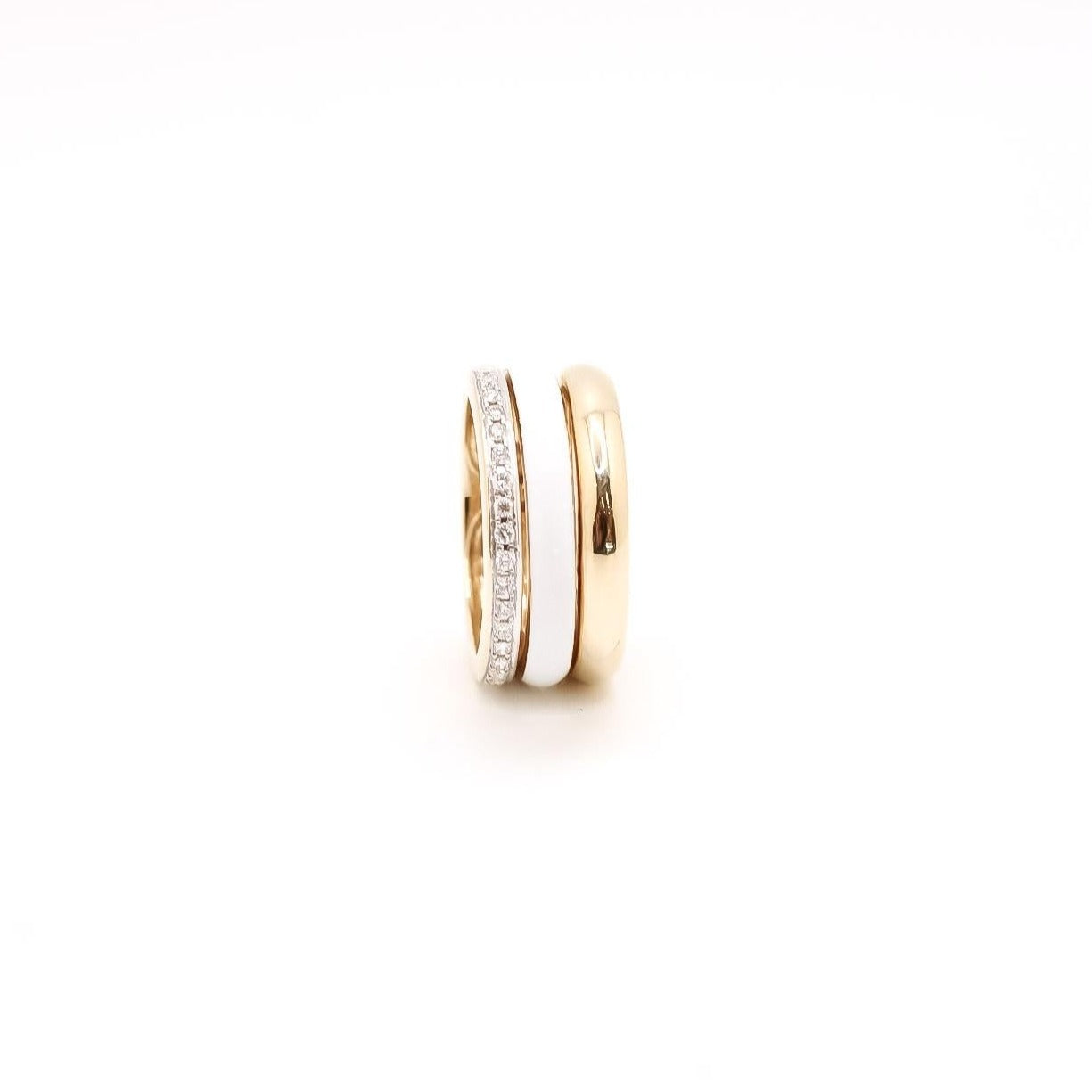 Anillo ancho de oro  en líneas esmaltada , lisa  y con diamantes