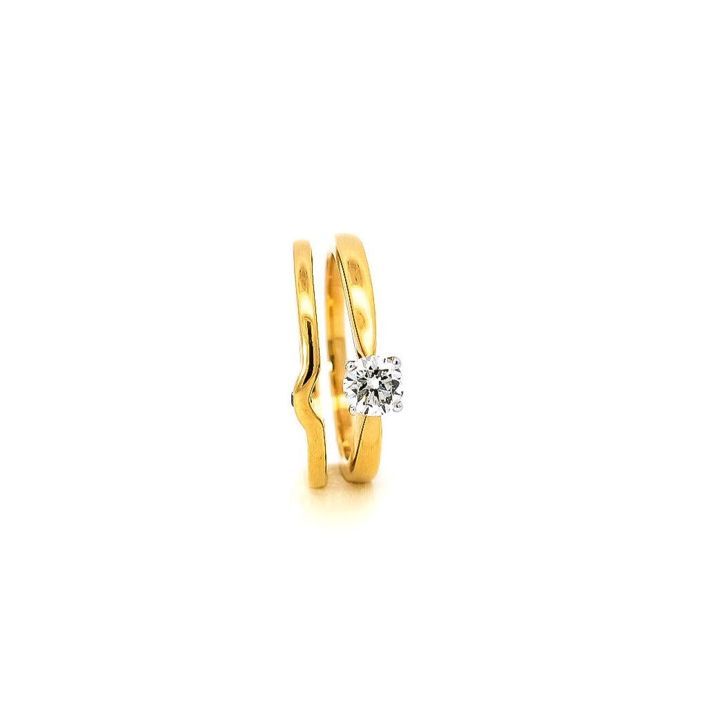 Anillo y alianza en oro amarillo 18kt con diamante