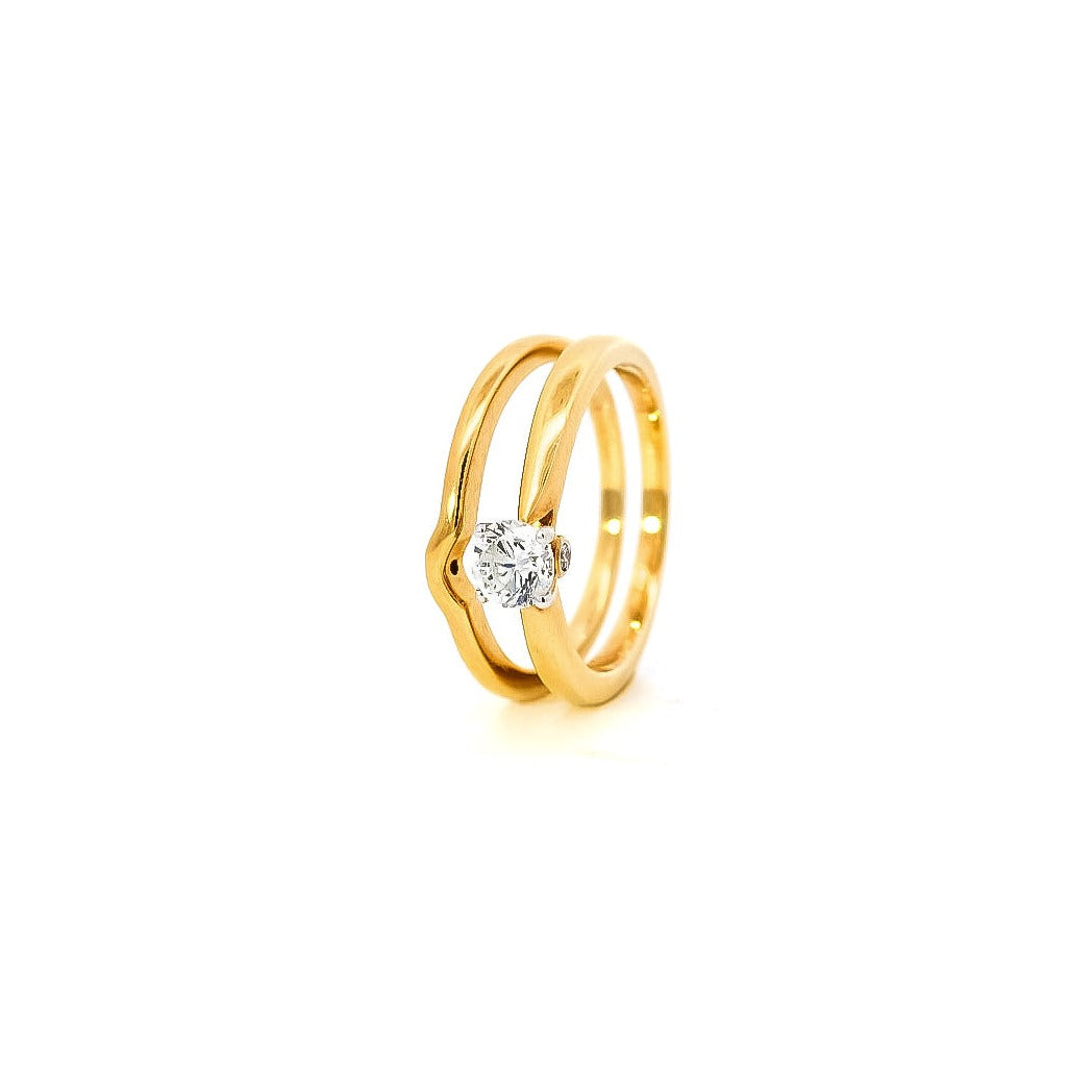 Anillo y alianza en oro amarillo 18kt con diamante