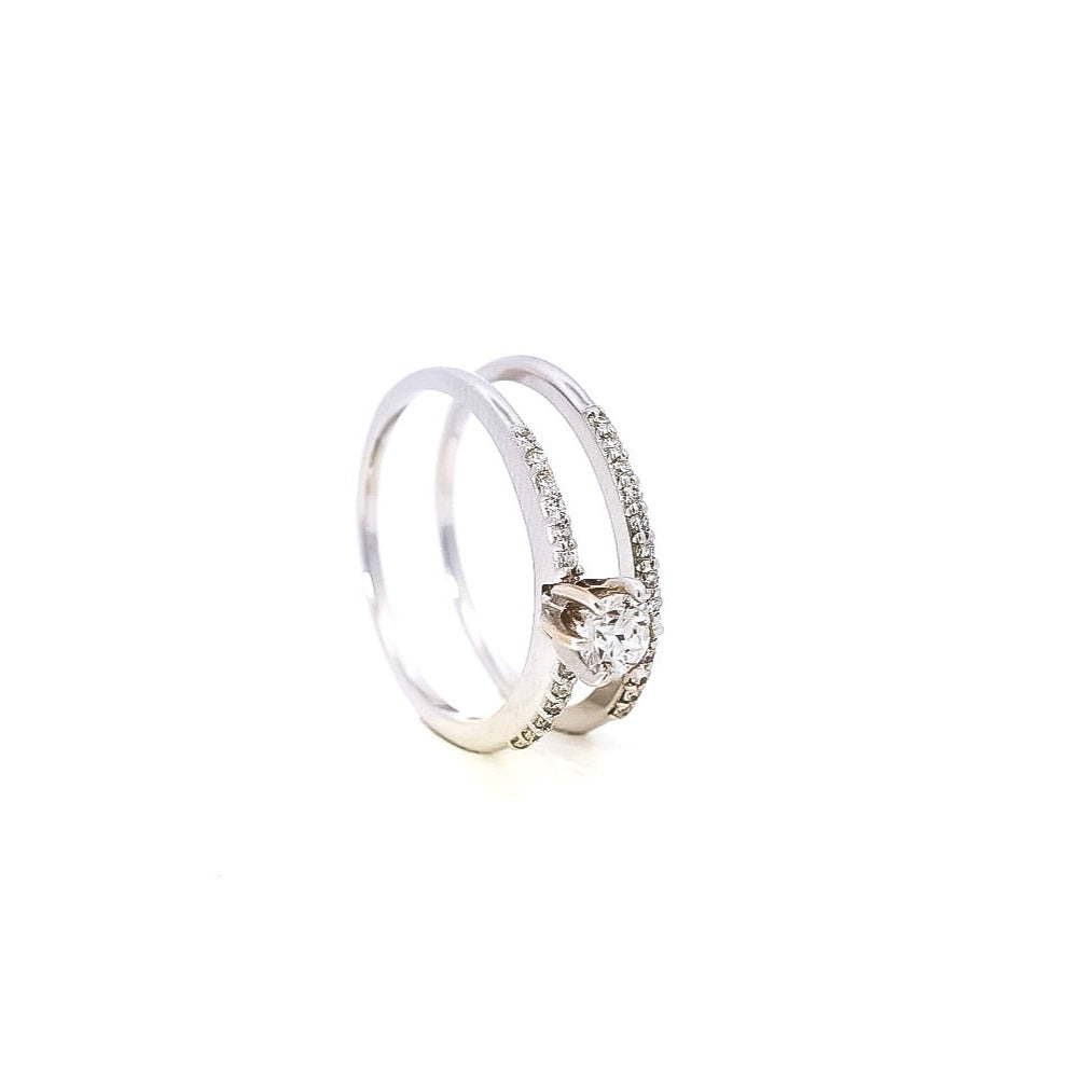 Juego de Alianza y anillo de compromiso en oro blanco 18kt tipo riviera