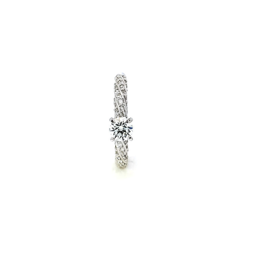 Anillo tipo pave en oro blanco 18kt con diamante