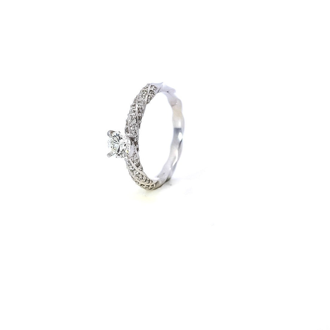 Anillo tipo pave en oro blanco 18kt con diamante