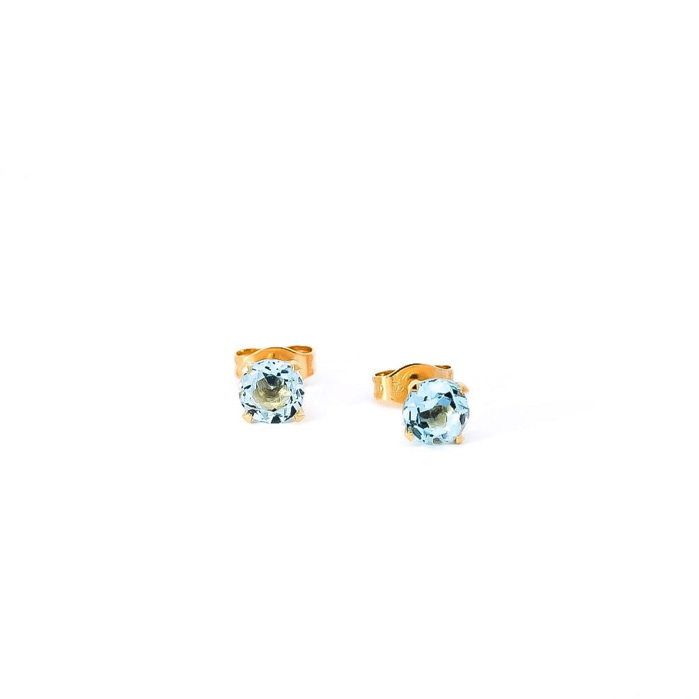 Aretes en oro amarillo 18kt con topacio