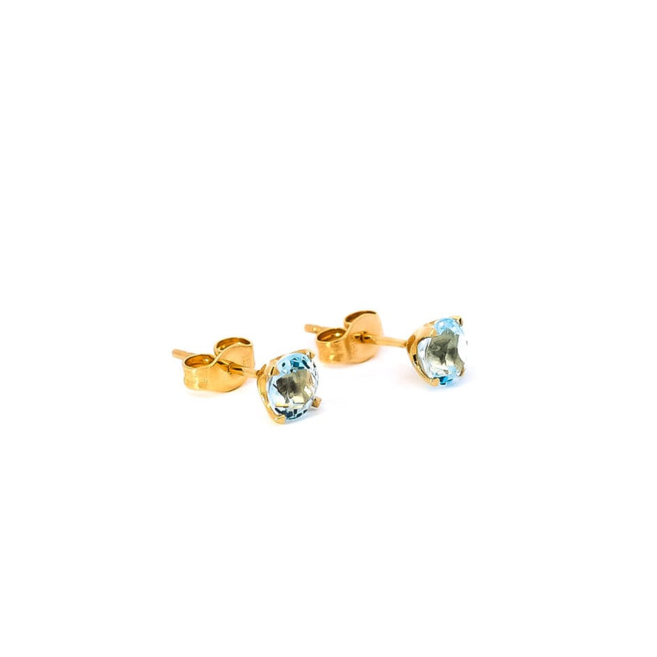 Aretes en oro amarillo 18kt con topacio