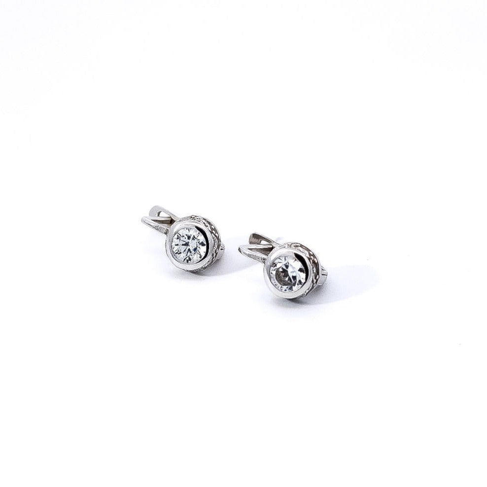 Aretes oro blanco 18kt tipo huggies con circones