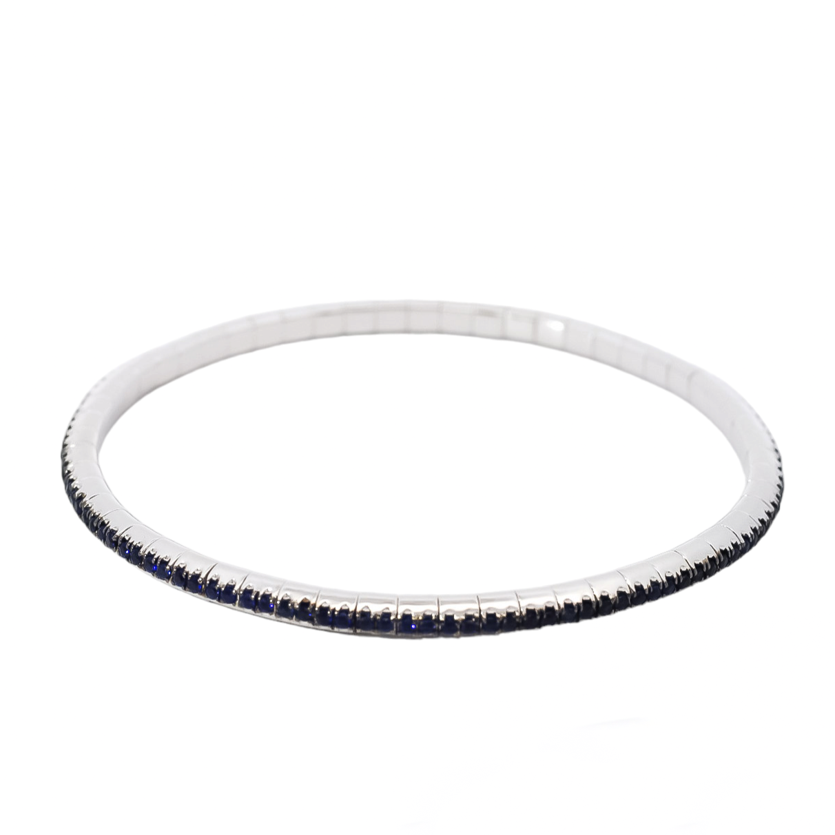 Pulsera tipo tenis en oro blanco 18kt con zafiros elástica