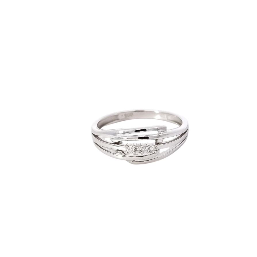Anillo oro blanco 18kt  con cuatro  diamantes centrales