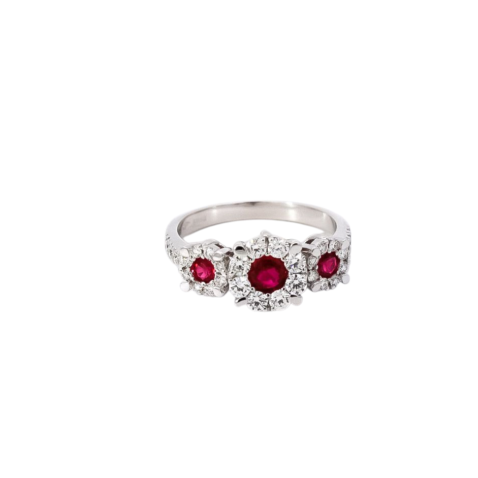 Anillo oro blanco 18kt diseño de tres flores en diamantes y rubis