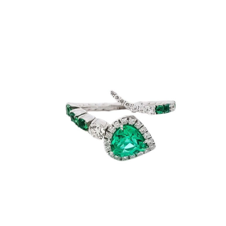 Anillo oro blanco 18kt diseño de serpiente con diamantes y esmeraldas