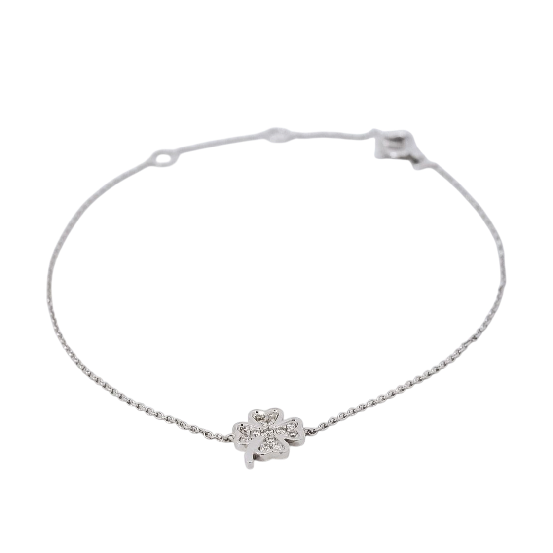 Pulsera delgada en oro blanco 18kt con dije de trébol en diamantes