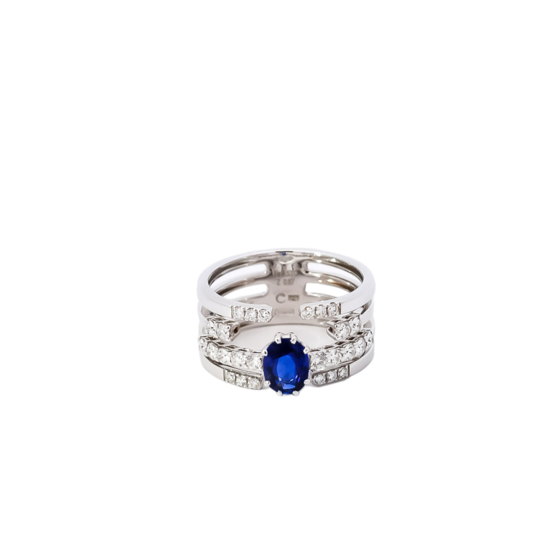 Anillo ancho oro blanco 18kt con diamantes y zafiro