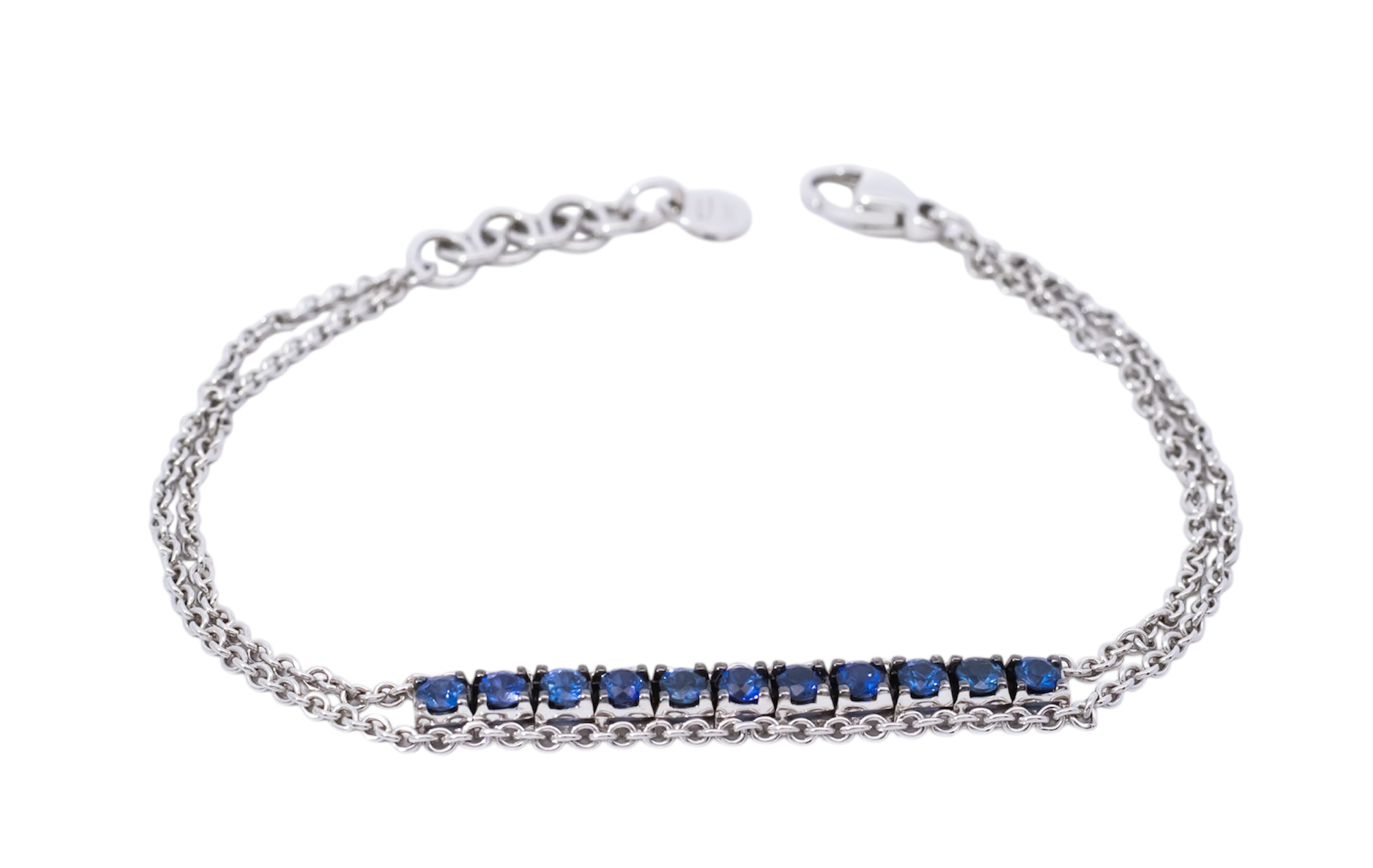 Pulsera oro blanco 18kt diseño de doble cadena con barra de zafiros