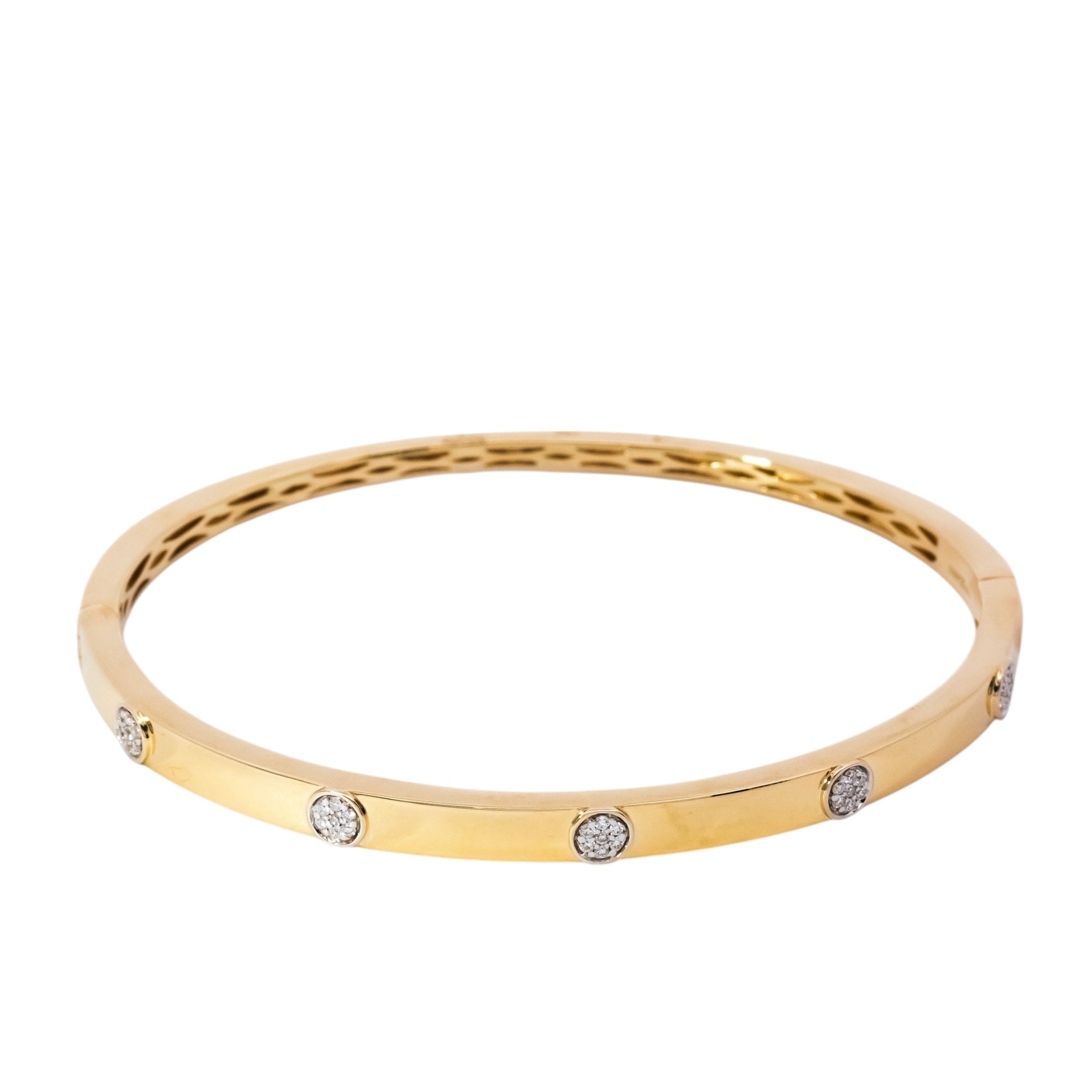 Pulsera oro amarillo tipo caña con diseño de círculos en diamantes