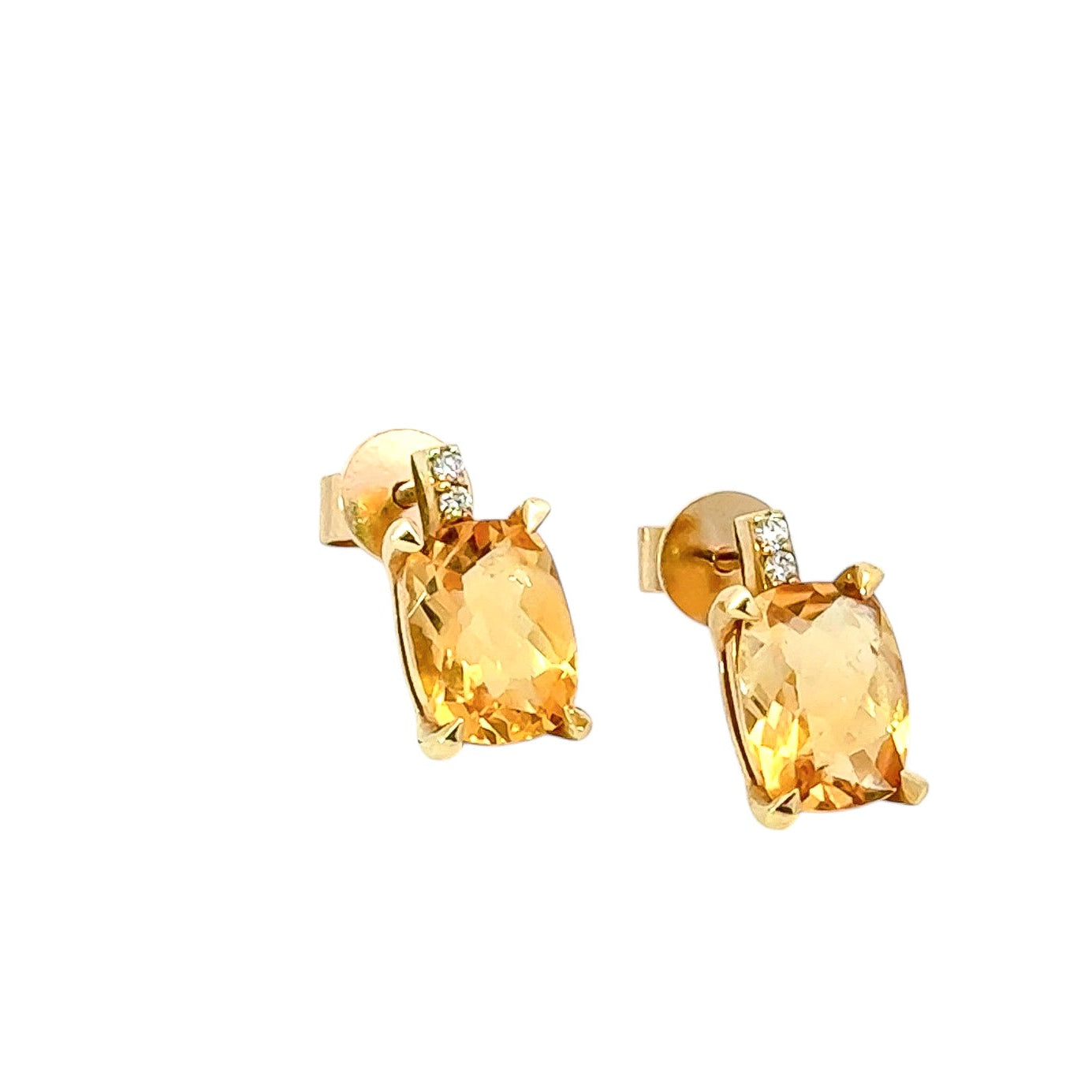 Aretes 18k con citrinas corte ovalado y diamantes
