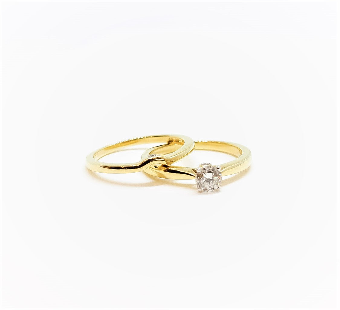 Anillo y alianza en oro amarillo 18kt con diamante