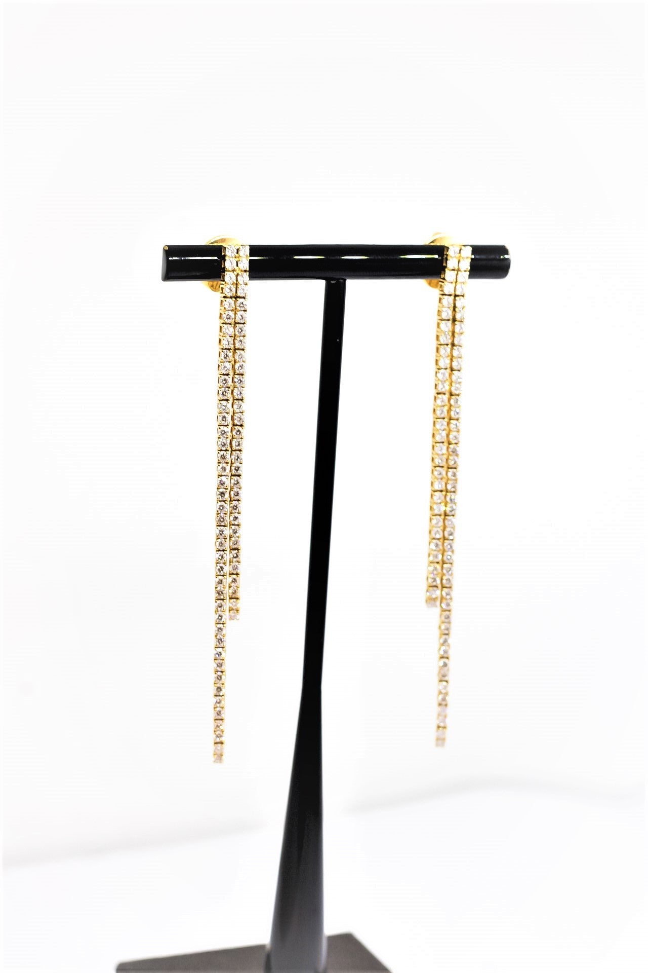 Aretes tenis largos doble líneas en oro amarillo 18kt  con diamantes